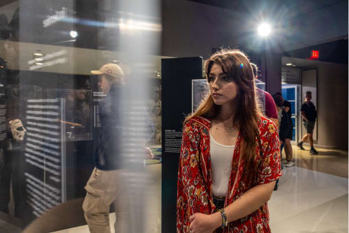 People visiting the galleries at the St. Catharines Museum and Welland Canals Centre.